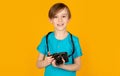 Boy using a cameras. Baby boy with camera. Cheerful smiling child holding a cameras. Little boy on a taking a photo Royalty Free Stock Photo