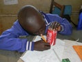 Boy using coca-cola cane base to draw circle Royalty Free Stock Photo