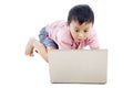 Boy using laptop seriously Royalty Free Stock Photo