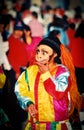 Boy using a mask of a monkey in Cuzco Peru