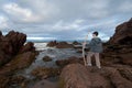 Boy views Sea and Rocks Royalty Free Stock Photo