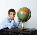 Boy with vintage globe