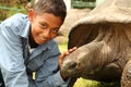 Boy visits Jonathan the tortoise on St Helena