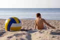 Boy with volleyball on beach. Royalty Free Stock Photo