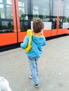 Boy waiting the tram