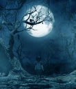 Boy walking alone at night under the moonlight