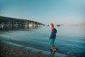 Boy walking on the beach