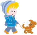 Boy walking with his dog