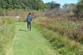 Boy Walking Through Nature Preserve Royalty Free Stock Photo