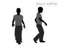 Boy in walking pose on white background