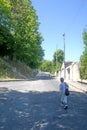 Boy walking up hill