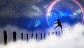 A boy walking on a wooden fence towards the beautiful moonlight Royalty Free Stock Photo