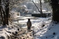 The boy walks in the park in the spring when the snow melts Royalty Free Stock Photo