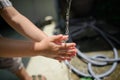 A boy is washing and cleaning his hands Royalty Free Stock Photo