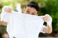 Boy washing cloth by his hand Royalty Free Stock Photo