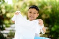 Boy washing cloth by his hand Royalty Free Stock Photo