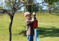 Boy Washing Golf Ball Royalty Free Stock Photo