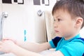 Boy washing hands, child personal health care, hygiene concept, kid washing hand in wash basin in bathroom,healthy lifestyle