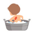 Boy Washing Himself with Brush in Vintage Bathtub Full of Foam, Back View, Adorable Little Kid in Bathroom, Daily Royalty Free Stock Photo