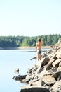 Boy watching lake