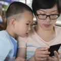 family with smartphone