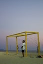 Boy watching soccer match of sand on the beach of Copacabana rio de janeiro