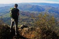 Boy watching the valley bellow Royalty Free Stock Photo