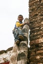 The boy on the watchtower in danba,sichuan,china Royalty Free Stock Photo