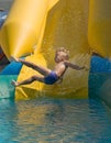 Boy on water slide Royalty Free Stock Photo