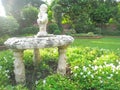 Boy water statue in the garden background Royalty Free Stock Photo