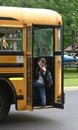 Boy Waving getting on Bus Royalty Free Stock Photo