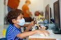 Boy wear face masks to prevent the Coronavirus 2019 COVID-19 in schools