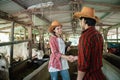 a boy wearing cowboy hat shaking hands with girls Royalty Free Stock Photo