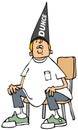 Boy wearing a dunce hat