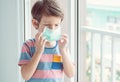 A boy wearing face mask to protect virus Royalty Free Stock Photo