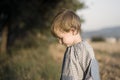 Boy wearing a kinder garden overall