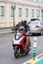 Boy wearing super hero helmet on a motorbike, bangkok Royalty Free Stock Photo