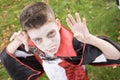 Boy wearing vampire costume on Halloween