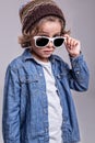 Boy wearing white sunglasses