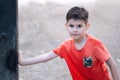 Boy with wet T-shirt. Playing with water. Royalty Free Stock Photo