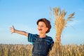 Boy on wheat field Royalty Free Stock Photo