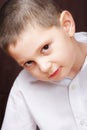 Boy in white shirt inclining right Royalty Free Stock Photo