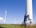 Boy and wind turbine Royalty Free Stock Photo