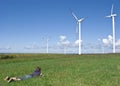 Boy and wind turbines Royalty Free Stock Photo