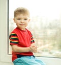 Boy on window