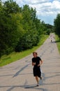 Boy winning marathon race Royalty Free Stock Photo