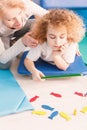 Boy working with physiotherapist Royalty Free Stock Photo