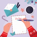 Boy writes letter with wishes for Father Christmas. Paraphernalia Christmas on background Royalty Free Stock Photo