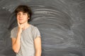 Boy writting on black board Royalty Free Stock Photo