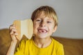 A boy, 6 years old, holds a box for milk teeth. Change of teeth Royalty Free Stock Photo